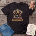 Outnumbered But Surviving Tee